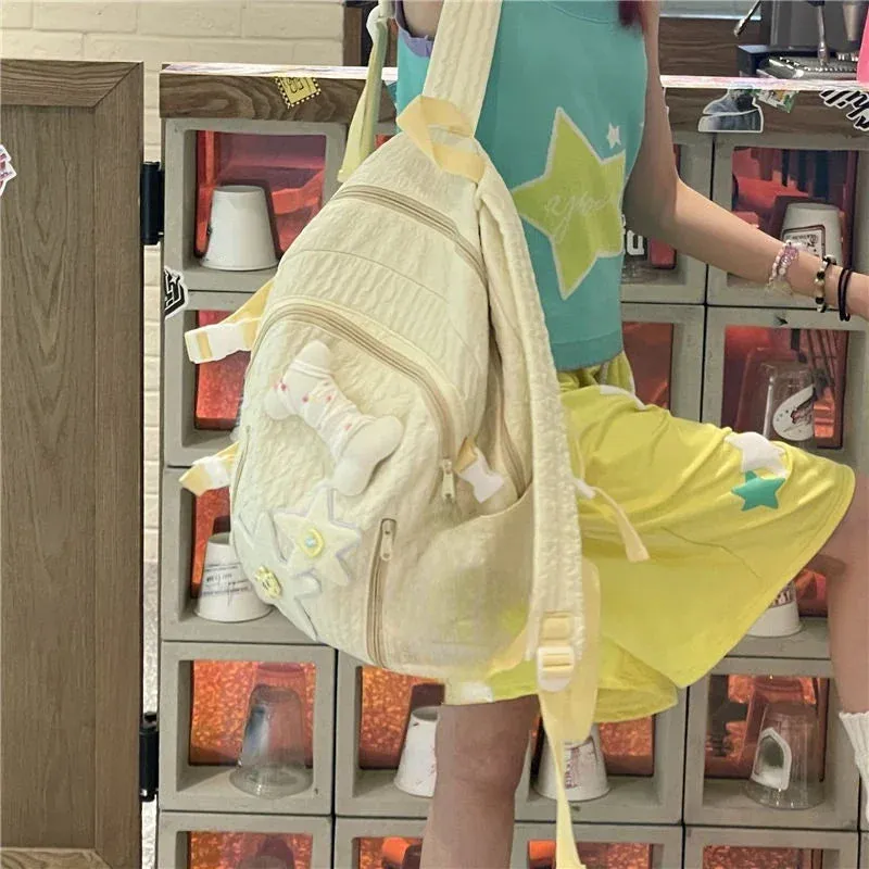 UAKISS  -  2024 High-capacity Pleated Kawaii Cute Star Backpack Girls Sweet Chic Casual Y2k Schoolbags Women Trendy  Backpacks for Students