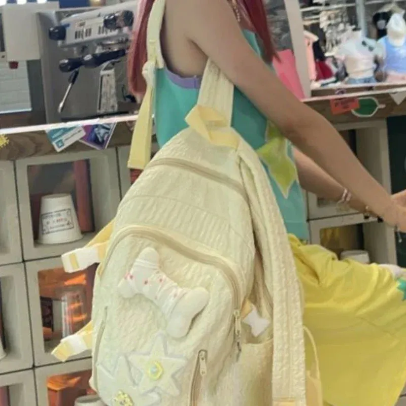 UAKISS  -  2024 High-capacity Pleated Kawaii Cute Star Backpack Girls Sweet Chic Casual Y2k Schoolbags Women Trendy  Backpacks for Students
