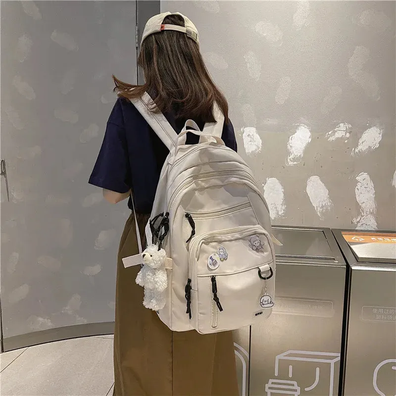 UAKISS  -  Fashion Big Student Backpack NEW Badge Rucksack Girls School Bag High Capacity Women Backpack Female Cute Leisure Travel Mochila