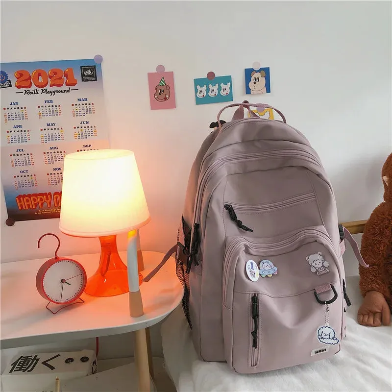 UAKISS  -  Fashion Big Student Backpack NEW Badge Rucksack Girls School Bag High Capacity Women Backpack Female Cute Leisure Travel Mochila