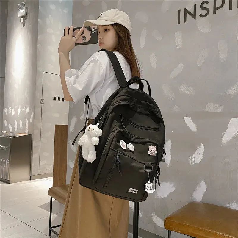 UAKISS  -  Fashion Big Student Backpack NEW Badge Rucksack Girls School Bag High Capacity Women Backpack Female Cute Leisure Travel Mochila