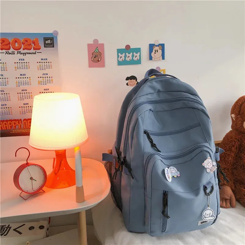 UAKISS  -  Fashion Big Student Backpack NEW Badge Rucksack Girls School Bag High Capacity Women Backpack Female Cute Leisure Travel Mochila