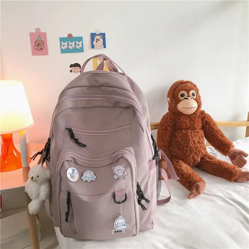 UAKISS  -  Fashion Big Student Backpack NEW Badge Rucksack Girls School Bag High Capacity Women Backpack Female Cute Leisure Travel Mochila